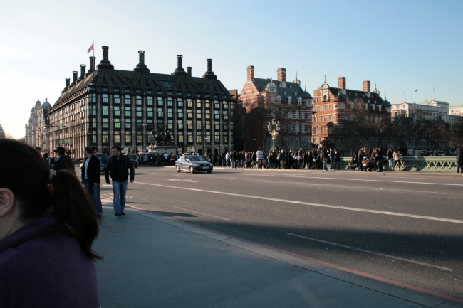 Portcullis House as seen from Westminster Bridge, Portcullis House is the building with the signature dark metal roof across the street from Big Ben