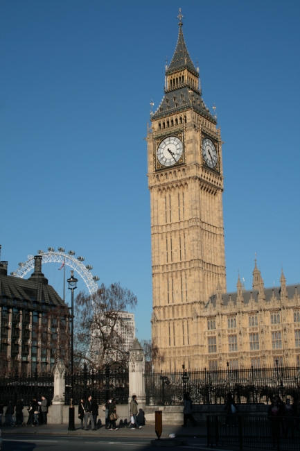 Closer zoomed Big Ben, garden fence, Portcullis and London Eye, 