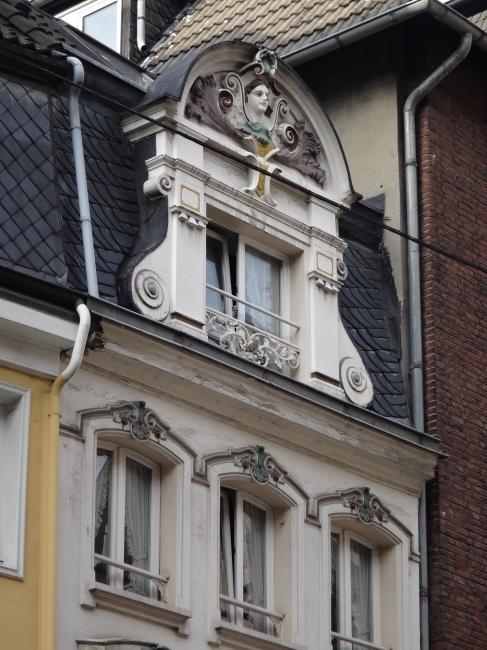 Picturesque window, detail of an old city house