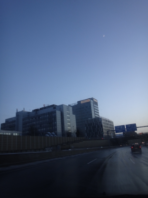 City Bank tower, Telekom building, Autobahn near Duisburg City, a crescent moon