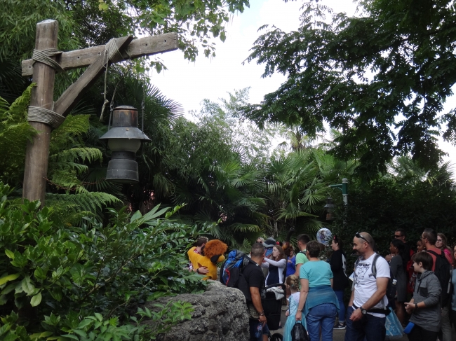 Lamp and meet the characters at the gateway to Adventureland, leaving Frontierland