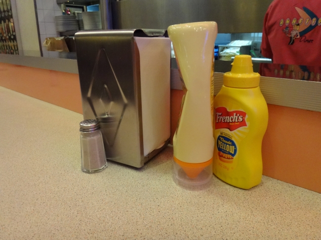 Annette's Diner: table top: French's dip, mayonaise and napkins, 