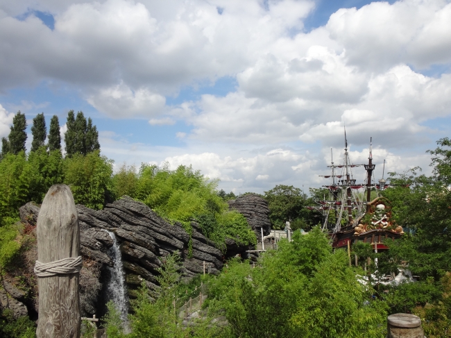 Looking north on the end of the suspension bridge, at adventure isle, Jolly Roger to the right