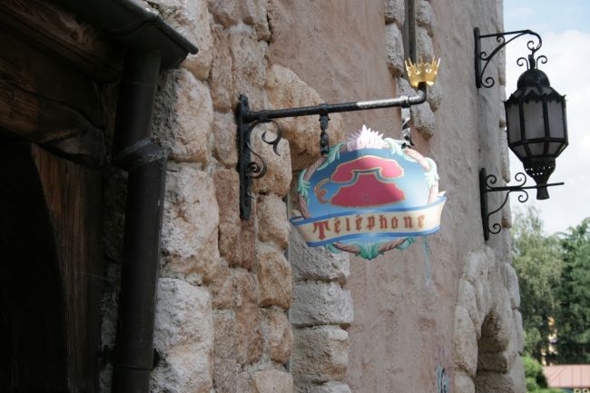 Telephone sign, near the Fanatasyland gate, at the toiltets/lavatories near Bella Note