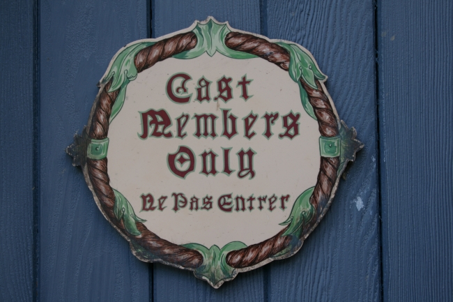 "Cast Members Only" sign ("Ne Pas Entrer"), on a door in Fantasyland, I think,  shoudl've been near the lavatories at the Fantasyland gate