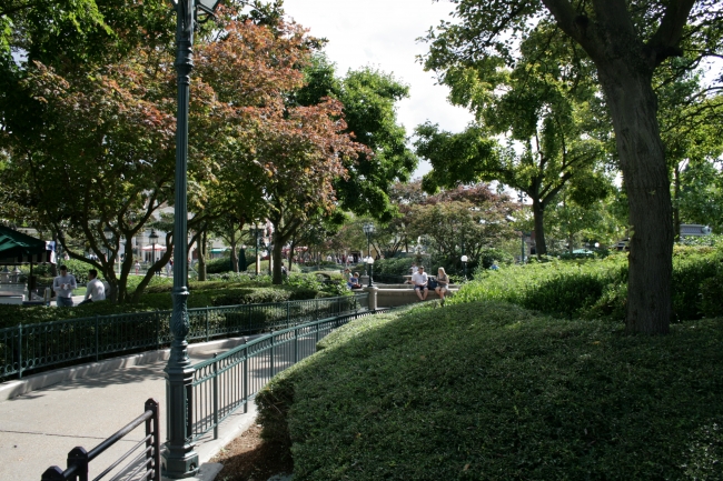 Gardens in front of Plaza Garden restaurant, the fountain on the right, actual Main Street on the left