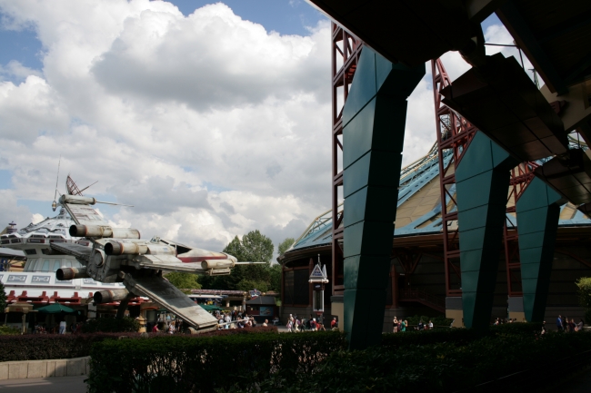 X-Wing, Star Tours and Discovery Mountain, seen through Videopolis stilts