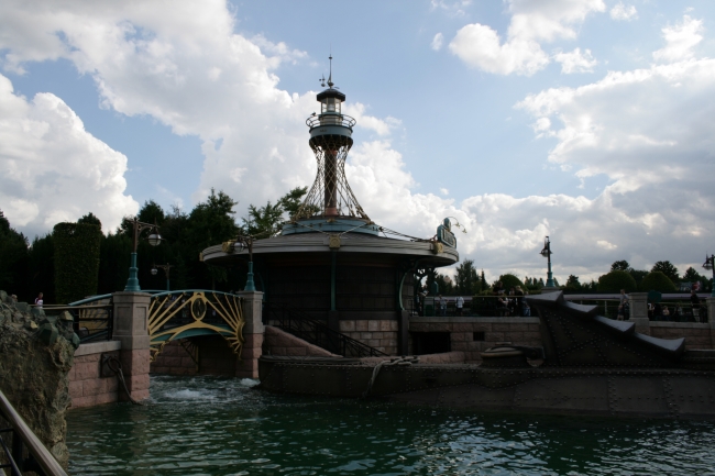 Les Mystères du Nautilus, with actual Nautilus in front, while the "lighthouse" lantern of the entry staircase is more prominent