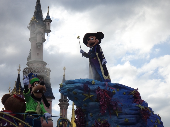 Mickey as seen in Fantasia, with Goofy during the Big Parade on Parade Route in Central Plaza, DLRP