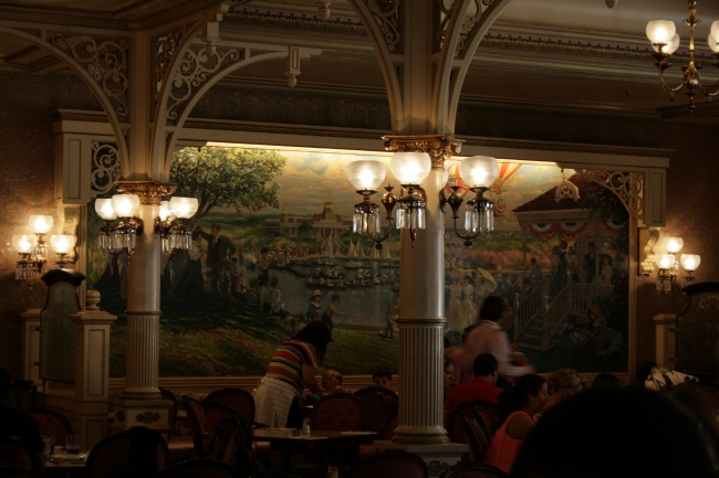 Inside Plaza Garden Restaurant, Wonderful fin-de-siecle wall mural artwork, note the lamps and chandeliers. Also, lamps cover the balloons on the wall mural here, expression of the ballon c...