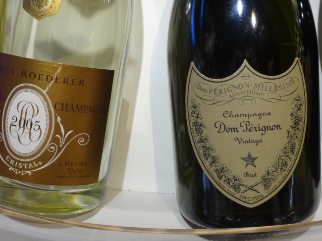 Champagner Dom Pérignon, Vintage, Brut, and to the left a bouteille of 2005 Roederer Champagner, at NCE Nice-Côte d'Azur airport